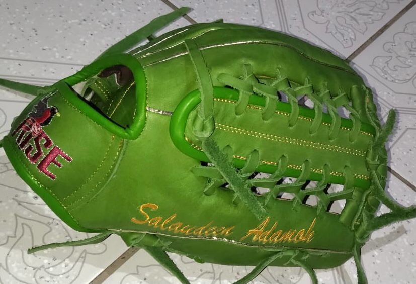 Close up of deep pocket and I-Web on RISE custom lime green softball glove, showing high-quality steerhide leather texture
