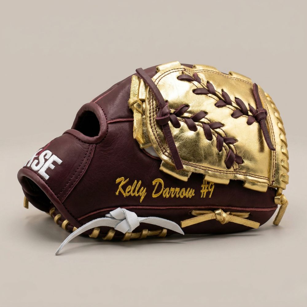 Custom RISE softball glove in maroon and gold featuring a two-piece modified web and personalized player embroidery.