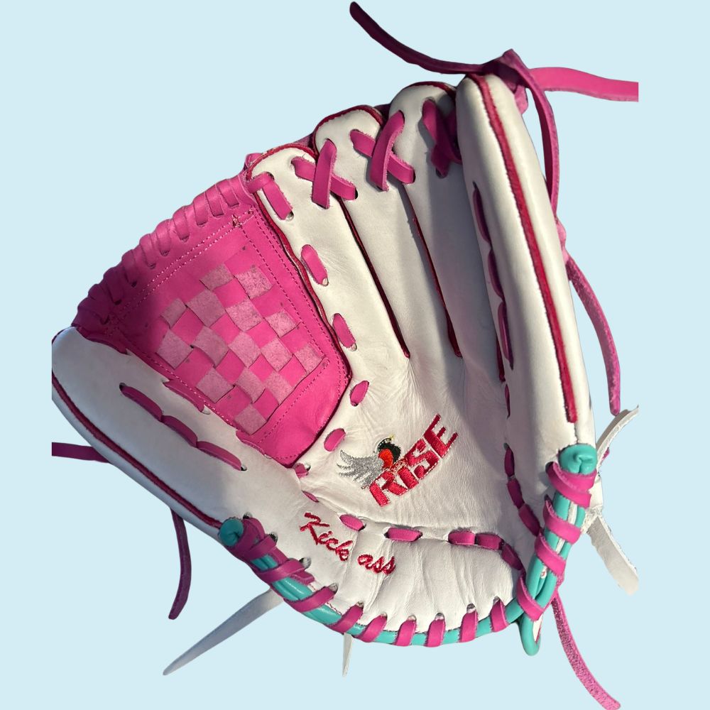 RISE custom fastpitch softball glove featuring a white base, pink basket web, teal accents, and personalized Wendy #15 finger script embroidery