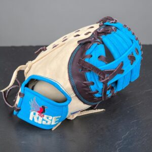 Back view of a cyan blue and tan RISE custom softball glove showing dark brown leather laces and reinforced web construction.